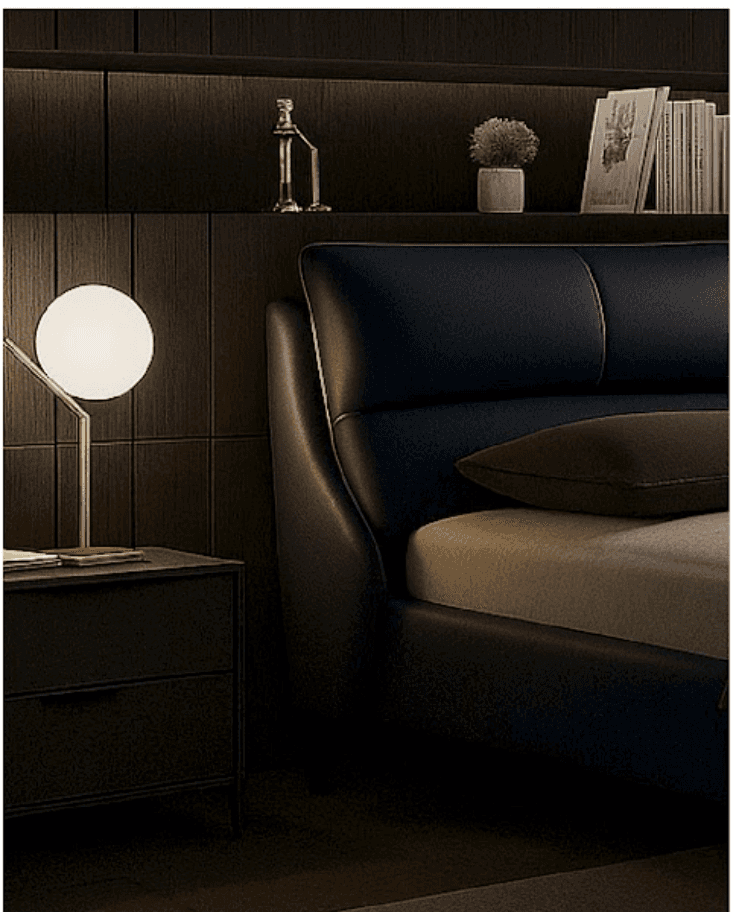 Sophisticated dark interior with leather seating and brass lighting