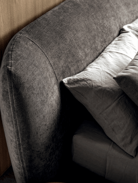 Close-up detail of premium grey upholstered furniture showing luxurious texture